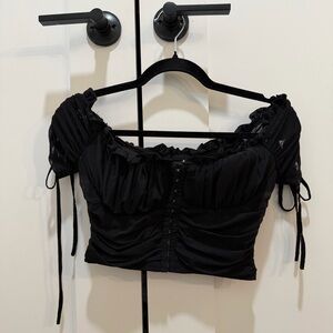 Black off shoulder crop top never